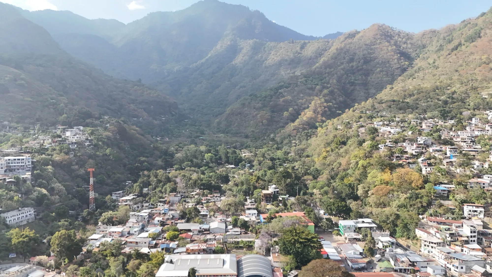 Homes and retreat properties terraced into the steep hillside above San Marcos La Laguna